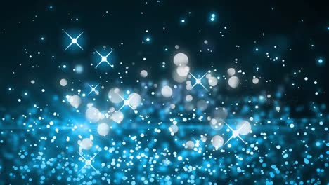 Blue-sparkles-and-white-glowing-spots-moving-against-black-background-