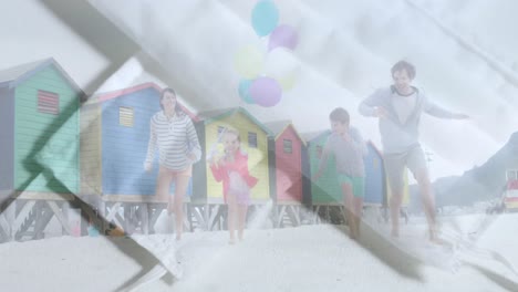 Digital-composite-video-of-face-masks-against-family-running-on-the-beach-in-background