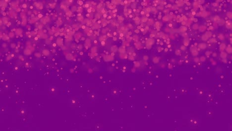 Pink-glowing-spots-moving-against-purple-background-