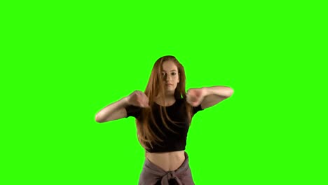Mujer-Joven-Bailando-Contra-El-Fondo-De-Pantalla-Verde