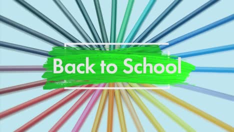 Back-To-School-text-over-brush-stroke-against-multicolored-pencils-spinning
