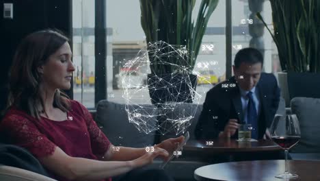 Web-of-connection-forming-a-globe-against-woman-using-digital-tablet--
