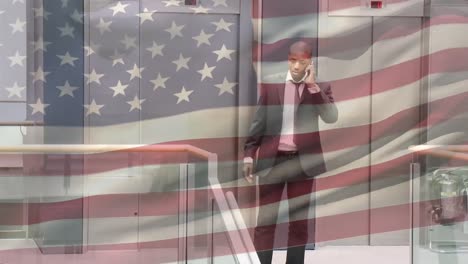 Animation-of-American-flag-waving-over-African-American-businessman