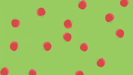 Animation-of-multiple-red-apples-rotating-and-falling-on-green-background