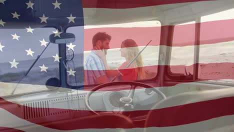 Animation-of-American-flag-waving-over-Caucasian-couple-on-beach-by-seaside