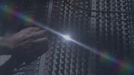 Animation-of-sound-producer-adjusting-sound-equalizer-with-spots-of-light-moving-in-foreground