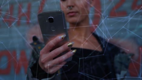 Network-of-connections-against-woman-using-smartphone