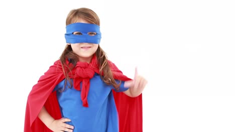Boom-text-on-speech-bubble-against-girl-in-superhero-costume-gesturing