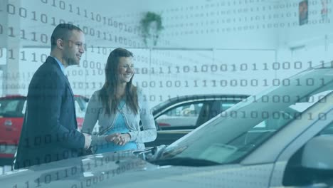 Animation-of-data-processing-over-man-and-woman-standing-in-a-car-shop
