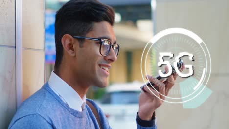 5G-text-on-circles-against-man-talking-on-smartphone