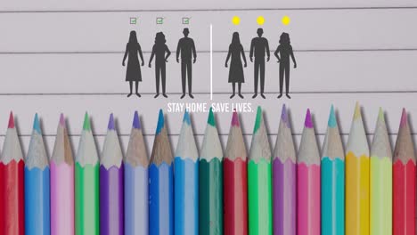 Multiple-colored-pencils-against-people-icons-maintaining-social-distancing