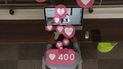 Heart-icons-and-numbers-over-female-doctor-on-laptop-screen.