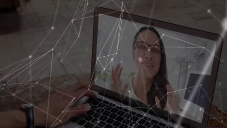 Network-of-connections-over-female-on-laptop-screen.