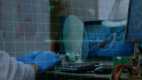 Fingerprint-scanner-against-scientist-using-computer