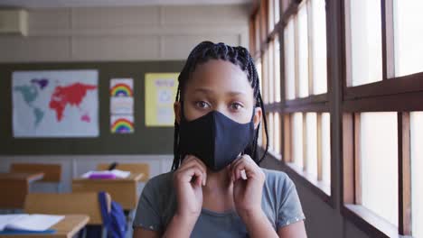 Girl-wearing-face-mask-in-the-class-at-school