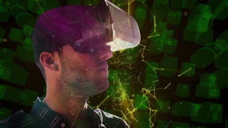 Network-of-connections-over-man-using-VR-headset-against-cityscape