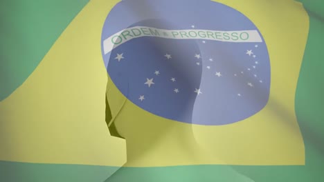 Bandera-Brasileña-Ondeando-Contra-Un-Modelo-De-Cabeza-Humana-Con-Máscara-Facial