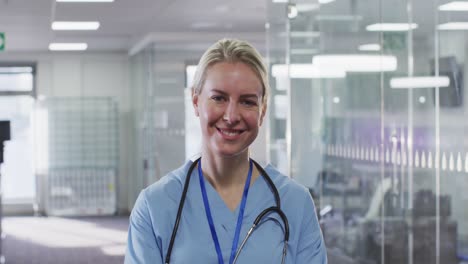 Portrait-of-female-doctor-smiling-in-hospital