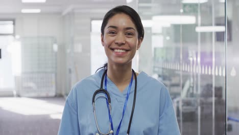 Portrait-of-female-doctor-smiling-in-hospital