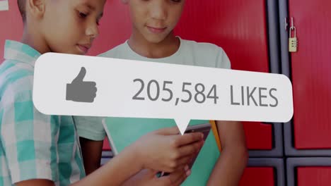 Speech-bubble-with-thumbs-up-icon-and-increasing-numbers-against-two-boys-using-smartphone