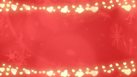 Schneeflocken-Fallen-Gegen-Leuchtende-Lichterketten-Auf-Rotem-Hintergrund