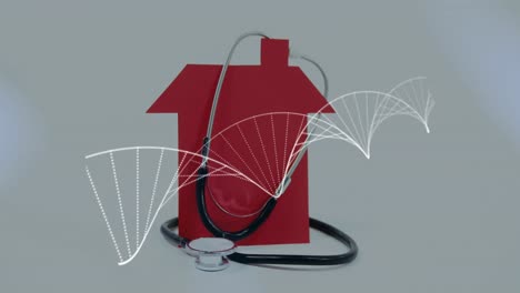 DNA-structure-against-stethoscope-on-red-house-Model-against-grey-background