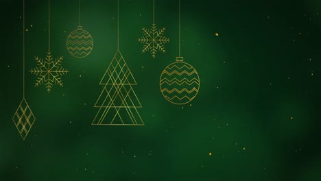 Christmas-decorations-hanging-against-green-background