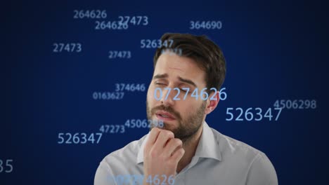 Multiple-numbers-changing-against-confused-man-on-blue-background