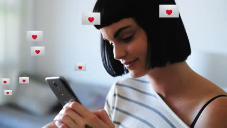 Multiple-envelope-with-heart-icon-floating-against-woman-using-smartphone