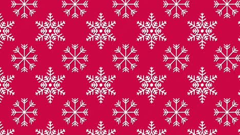 Traditionelles-Weihnachtsmuster-Mit-Schneeflocken,-Die-Sich-Vor-Rotem-Hintergrund-Bewegen