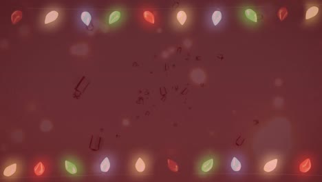 Glowing-spots-of-light-and-Christmas-presents-against-red-background
