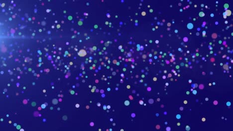 Multicolored-spots-of-light-moving-against-blue-background