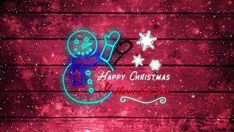Snowflakes-falling-over-neon-snowman-against-red-wooden-background