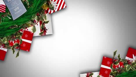Digital-animation-of-christmas-decorations-and-gifts-against-grey-background
