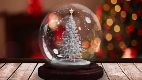 Animation-of-christmas-tree-in-snow-globe-with-glowing-fairy-lights-and-shooting-star-on-wooden-surf