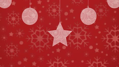 Digital-animation-of-christmas-bauble-and-star-decorations-against-snowflakes-print-on-red-backgroun