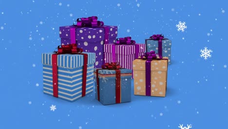Digitale-Animation-Von-Schnee,-Der-über-Mehrere-Weihnachtsgeschenkboxen-Vor-Blauem-Hintergrund-Fällt