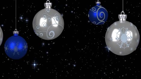 Animation-Von-Blauen-Und-Silbernen-Weihnachtskugeln-Mit-Sternen-Am-Nachthimmel-Im-Hintergrund