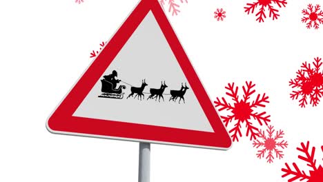 Animation-of-road-sign-with-black-silhouette-of-santa-claus-in-sleigh-being-pulled-by-reindeer