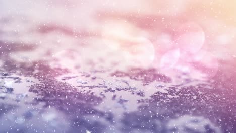 Digital-animation-of-spots-of-light-against-snow-falling-over-winter-landscape