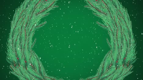 Digital-animation-of-snow-falling-over-christmas-wreath-against-green-background