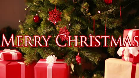 Animation-of-merry-christmas-text-over-christmas-tree-and-presents
