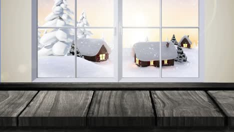 Animation-Einer-Winterlichen-Weihnachtslandschaft-Mit-Schnee,-Der-über-Bäume-Und-Häuser-Fällt-Und-Durch-Das-Fenster-Gesehen-Wird