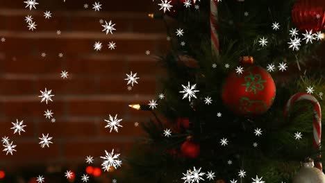 Animation-of-decorated-christmas-tree,-fairy-lights-and-snow-falling