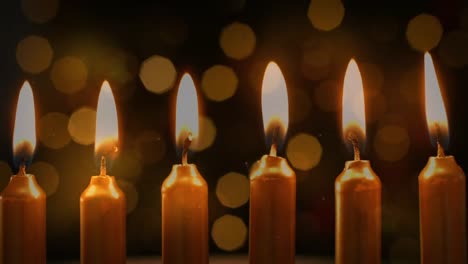 Animation-of-lit-candles-with-flickering-lights-in-the-background