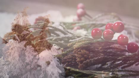 Animation-of-christmas-decorations-with-winter-scenery-in-the-background