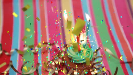 Animation-of-multi-coloured-confetti-falling-over-cupcake-with-candle