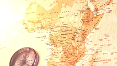 Animation-Des-Kompasses-Und-Flackernde-Karte-Von-Afrika-Im-Hintergrund
