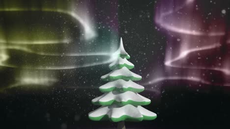 Animation-of-yellow-and-pink-aurora-borealis-lights-moving-over-fir-tree