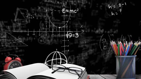 Animation-of-mathematical-drawings-and-symbols-over-blackboard-with-book,-glasses-and-coloured-penci